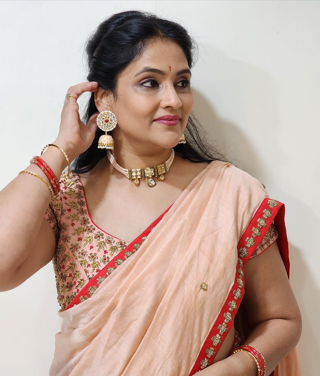 Telugu Actress Gayatri Bhargavi Stills in Orange Saree